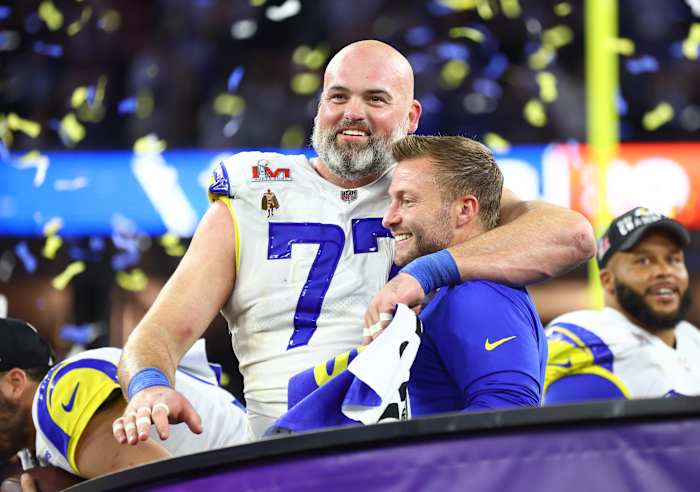 Feb 13, 2022; Inglewood, CA, USA; Los Angeles Rams head coach Sean McVay and offensive tackle Andrew Whitworth (77) celebrate after defeating the Cincinnati Bengals in Super Bowl LVI at SoFi Stadium. Mandatory Credit: Mark J. Rebilas-USA TODAY Sports